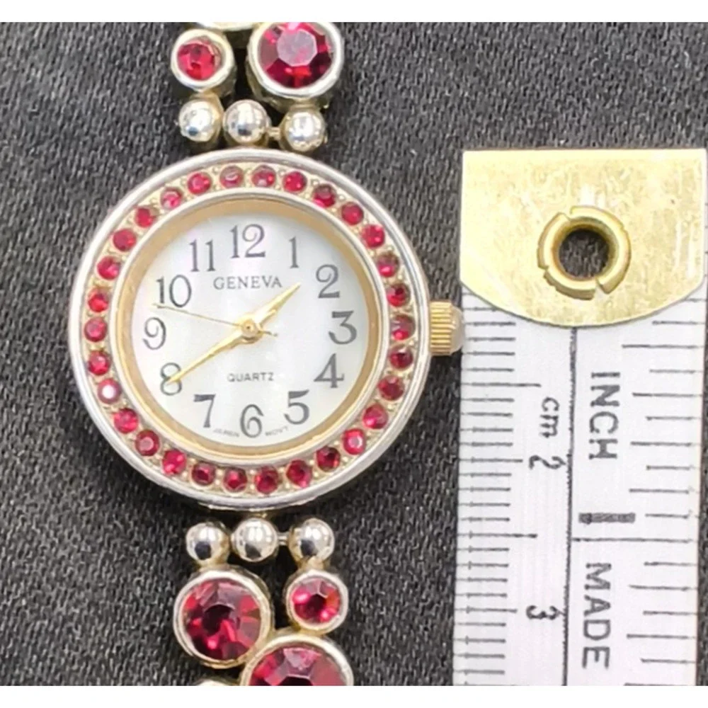 Vintage Geneva Watch Women's Round Silver Tone Red Crystals Inset MOP #W5156